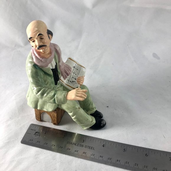 Vintage Porcelain Figurine Sitting Man in Green Suit Holding Sheet Music Hand Pa - Picture 9 of 9